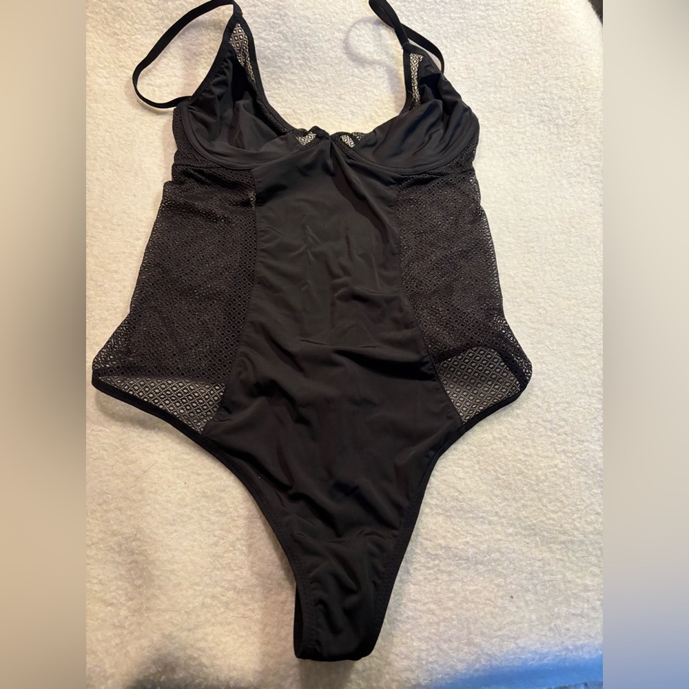 Victoria’s Secret bodysuit, size 34B (small).